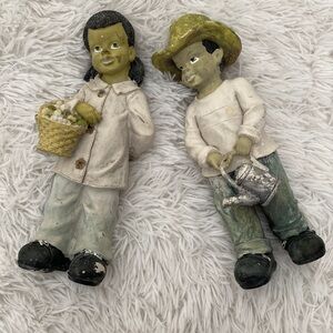 Old figures farming couple